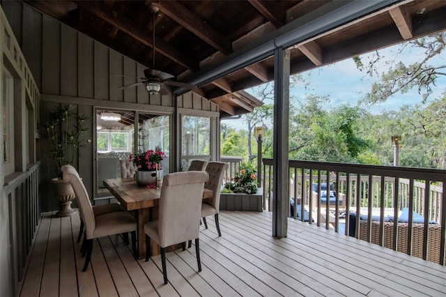 deck featuring a ceiling fan and outdoor dining space