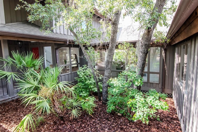 1296 Weybridge Ln, Dunedin, FL 34698 - view of home's exterior with board and batten siding