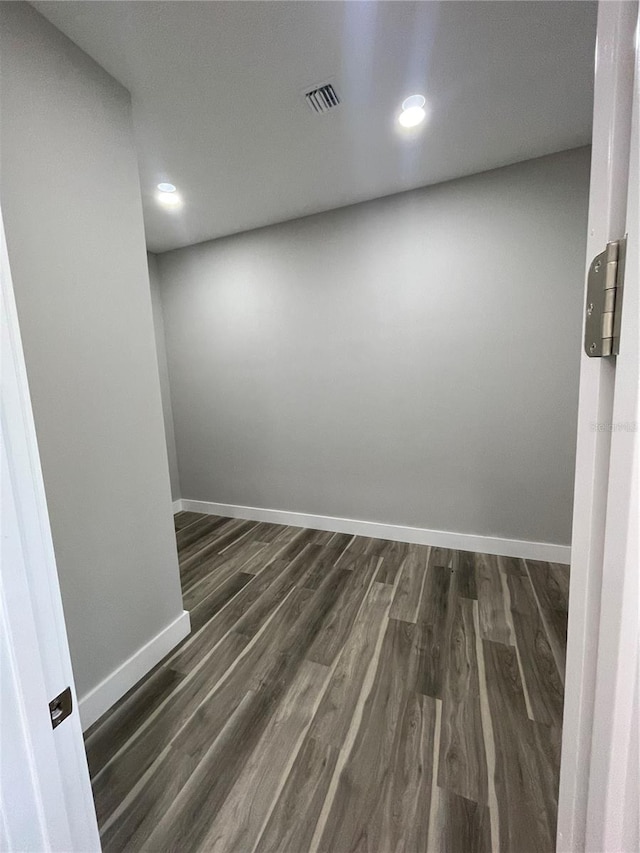 12308 Pittsfield Ave, Tampa, FL 33624 - empty room featuring dark wood-style floors, baseboards, and recessed lighting