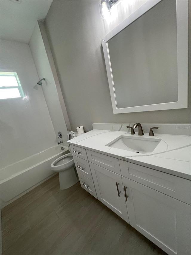 12308 Pittsfield Ave, Tampa, FL 33624 - full bathroom featuring toilet, vanity, and washtub / shower combination