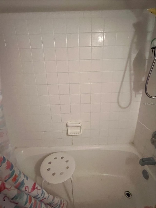 11201 122nd Ave Unit 129, Largo, FL 33778 - bathroom with shower / bath combination with curtain