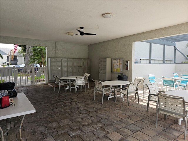 11201 122nd Ave Unit 129, Largo, FL 33778 - view of patio featuring mail area and fence