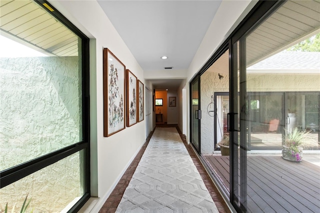 4009 Carrollwood Village Dr, Tampa, FL 33618 - corridor featuring baseboards and recessed lighting