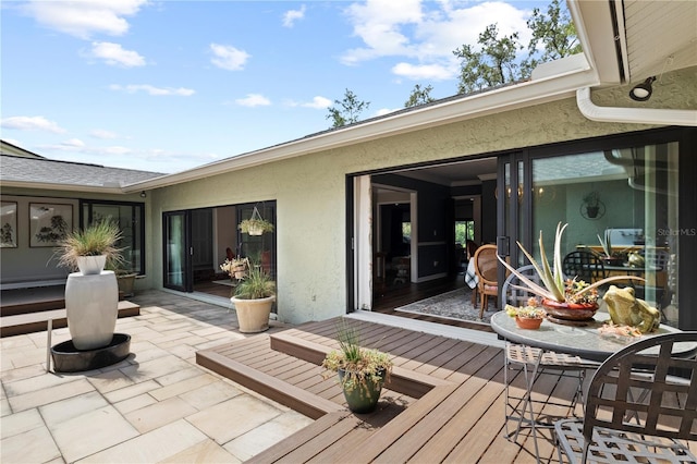 4009 Carrollwood Village Dr, Tampa, FL 33618 - deck with a patio and outdoor dining area