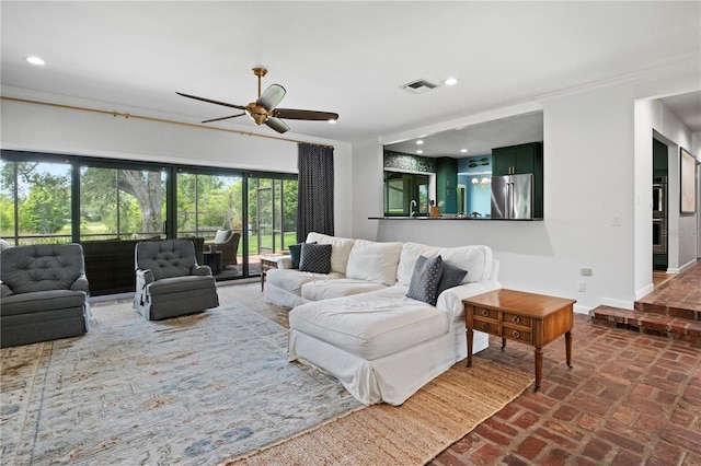 4009 Carrollwood Village Dr, Tampa, FL 33618 - living area featuring brick floors, baseboards, a ceiling fan, recessed lighting, and crown molding