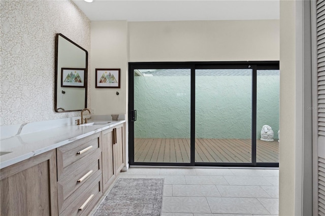 4009 Carrollwood Village Dr, Tampa, FL 33618 - bathroom featuring vanity, tile patterned floors, a closet, and a textured wall