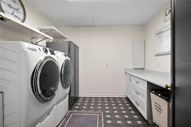 4009 Carrollwood Village Dr, Tampa, FL 33618 - washroom with washer and dryer, dark flooring, baseboards, and attic access