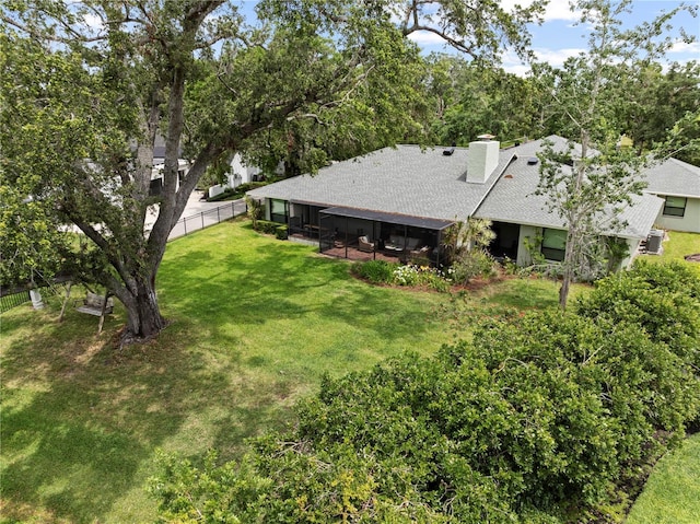 4009 Carrollwood Village Dr, Tampa, FL 33618 - view of yard featuring a sunroom and central AC
