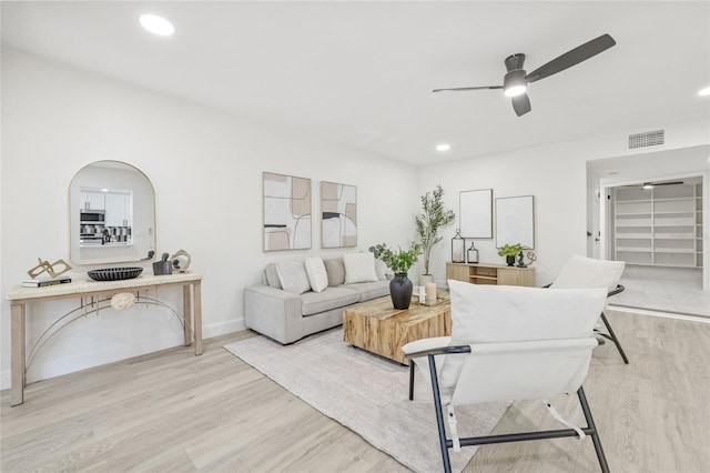 13934 Clubhouse Cir Unit 8, Tampa, FL 33618 - living room featuring light wood-type flooring, a ceiling fan, baseboards, and recessed lighting