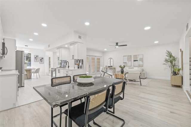 13934 Clubhouse Cir Unit 8, Tampa, FL 33618 - dining room with recessed lighting, ceiling fan, french doors, and baseboards