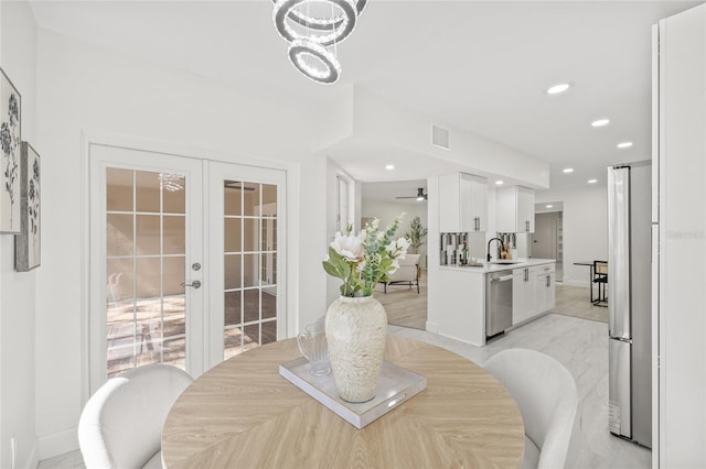 13934 Clubhouse Cir Unit 8, Tampa, FL 33618 - dining room featuring french doors, baseboards, ceiling fan, and recessed lighting