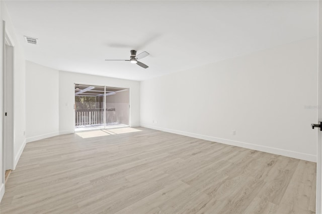 13934 Clubhouse Cir Unit 8, Tampa, FL 33618 - empty room featuring a ceiling fan, light wood-type flooring, and baseboards