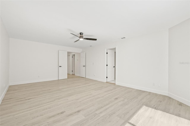13934 Clubhouse Cir Unit 8, Tampa, FL 33618 - empty room featuring light wood-style floors, a ceiling fan, and baseboards