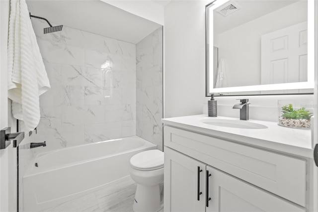 13934 Clubhouse Cir Unit 8, Tampa, FL 33618 - bathroom featuring toilet, vanity, and shower / tub combination