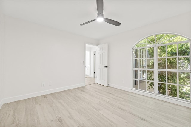 13934 Clubhouse Cir Unit 8, Tampa, FL 33618 - empty room with a ceiling fan, baseboards, and wood finished floors