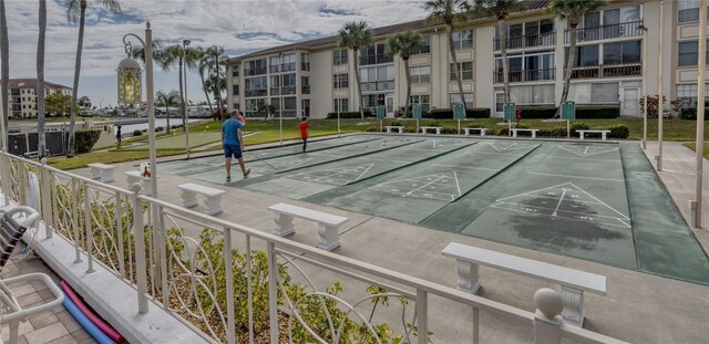 view of property's community with shuffleboard