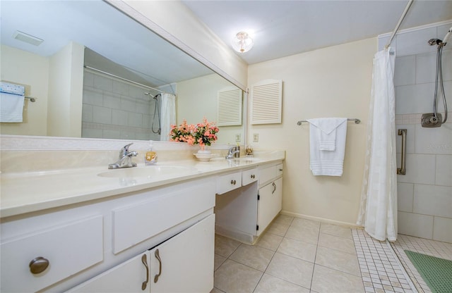 19029 US Highway 19 N Unit 31F, Clearwater, FL 33764 - full bath with a tile shower, tile patterned flooring, double vanity, and baseboards