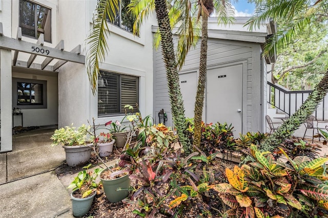 11440 Harbor Way Unit 5009, Largo, FL 33774 - doorway to property with stucco siding