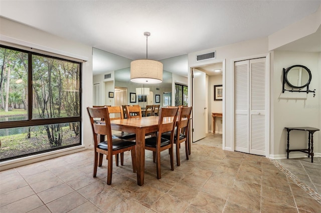 11440 Harbor Way Unit 5009, Largo, FL 33774 - dining space with plenty of natural light and baseboards