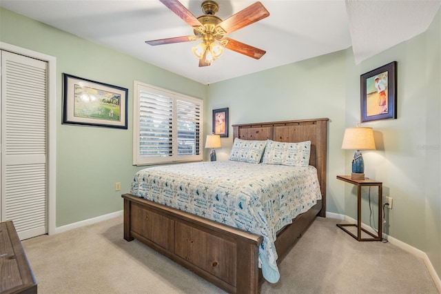 11440 Harbor Way Unit 5009, Largo, FL 33774 - carpeted bedroom featuring baseboards, a closet, and ceiling fan