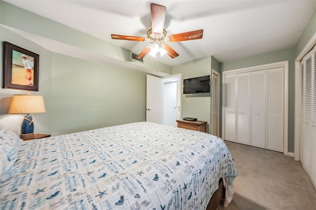11440 Harbor Way Unit 5009, Largo, FL 33774 - carpeted bedroom with multiple closets and a ceiling fan