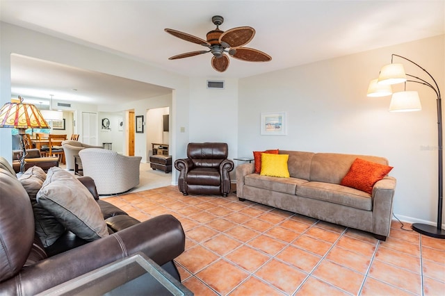 11440 Harbor Way Unit 5009, Largo, FL 33774 - living area with light tile patterned floors and ceiling fan