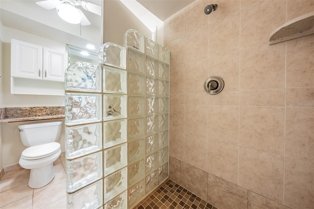 11440 Harbor Way Unit 5009, Largo, FL 33774 - bathroom featuring a walk in shower, tile patterned floors, toilet, and a ceiling fan