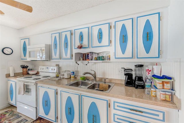 11200 102nd Ave Unit 75, Seminole, FL 33778 - kitchen featuring white appliances, a sink, a textured ceiling, light countertops, and open shelves
