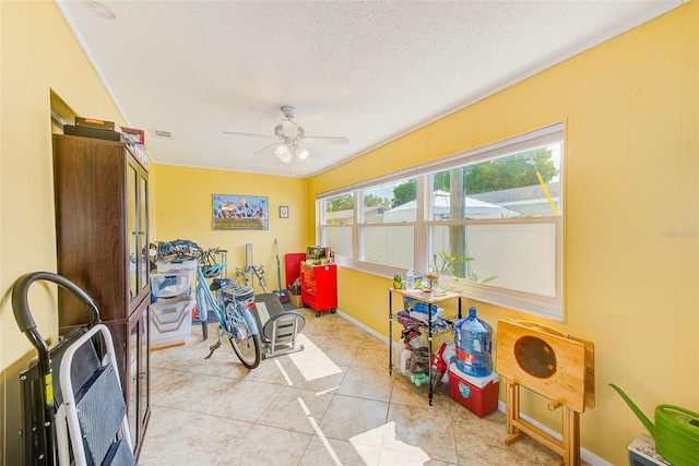 11200 102nd Ave Unit 75, Seminole, FL 33778 - rec room with ceiling fan, a textured ceiling, and light tile patterned flooring