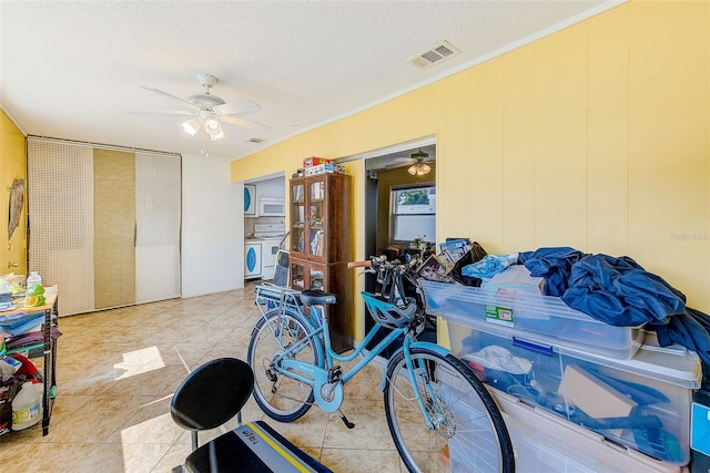 11200 102nd Ave Unit 75, Seminole, FL 33778 - misc room featuring a ceiling fan, a textured ceiling, and light tile patterned floors