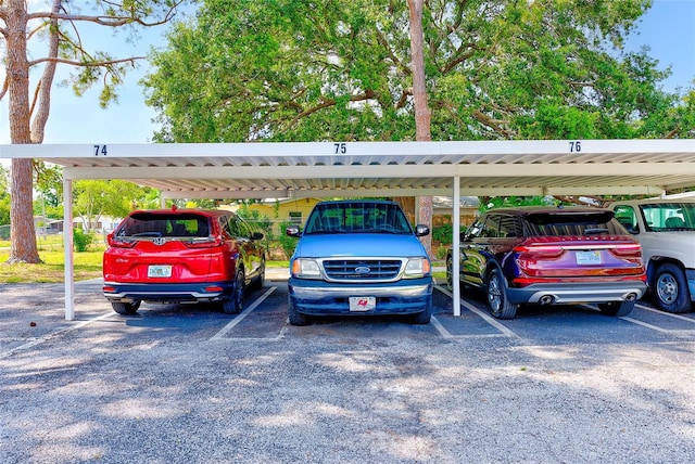 11200 102nd Ave Unit 75, Seminole, FL 33778 - view of covered parking lot