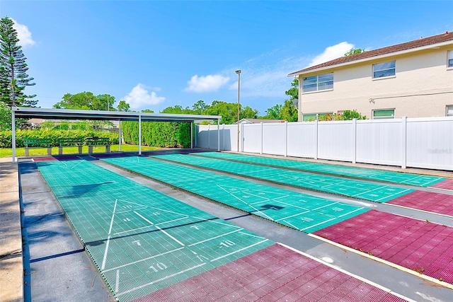 11200 102nd Ave Unit 75, Seminole, FL 33778 - view of community with fence and shuffleboard