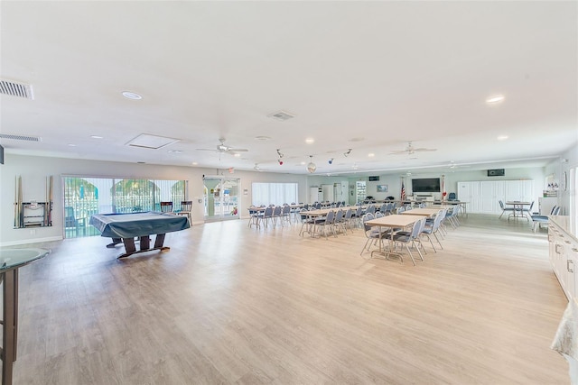 11200 102nd Ave Unit 75, Seminole, FL 33778 - dining room with a ceiling fan, billiards, recessed lighting, and light wood finished floors