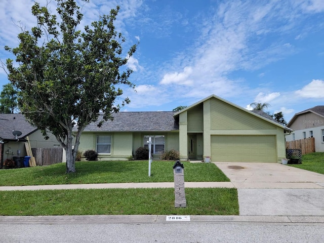 2816 Manor Hill Dr, Brandon, FL 33511 - mid-century home featuring an attached garage, driveway, and stucco siding