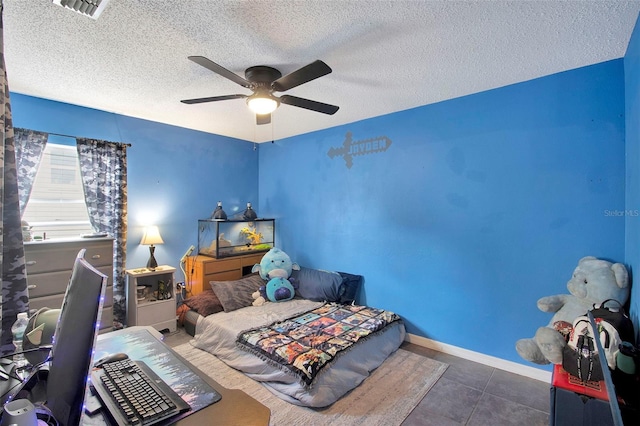 2816 Manor Hill Dr, Brandon, FL 33511 - bedroom with a textured ceiling and ceiling fan