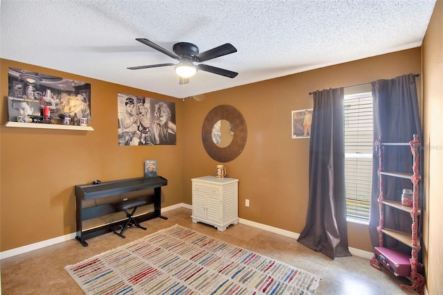 2816 Manor Hill Dr, Brandon, FL 33511 - living area featuring ceiling fan, healthy amount of natural light, tile patterned floors, and a textured ceiling