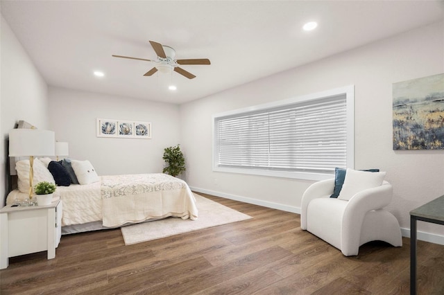 bedroom featuring baseboards, wood finished floors, recessed lighting, and a ceiling fan