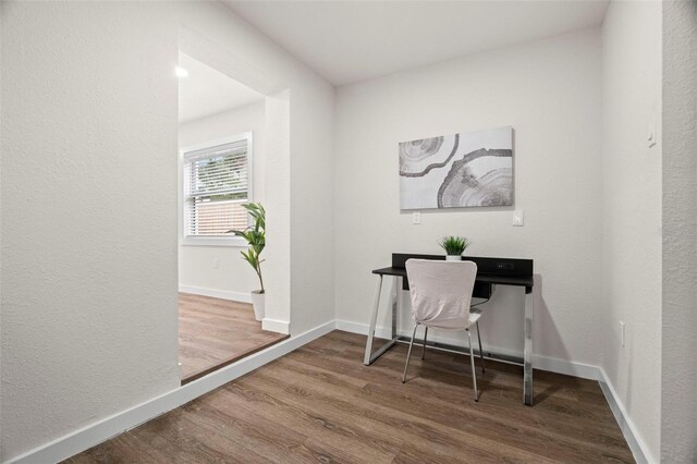 office with wood finished floors and baseboards
