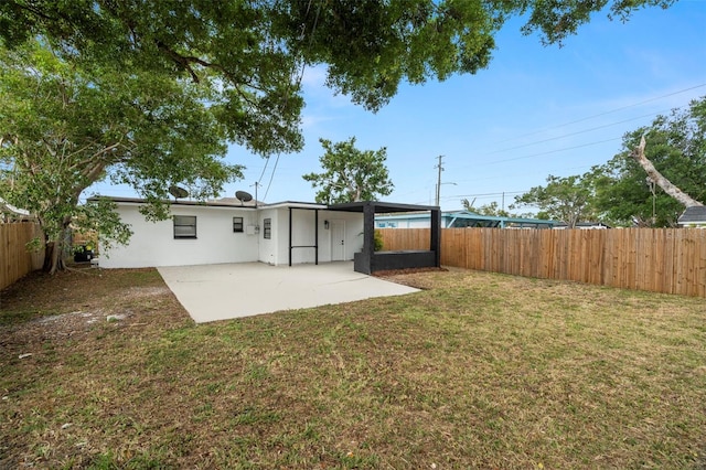back of house featuring a patio area