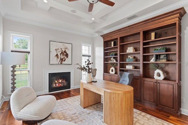 17129 Breeders Cup Dr, Odessa, FL 33556 - office featuring crown molding, coffered ceiling, wood finished floors, a glass covered fireplace, and ceiling fan