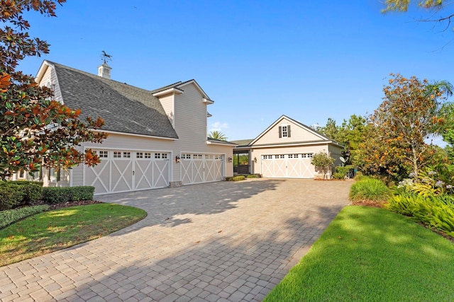 17129 Breeders Cup Dr, Odessa, FL 33556 - garage with decorative driveway
