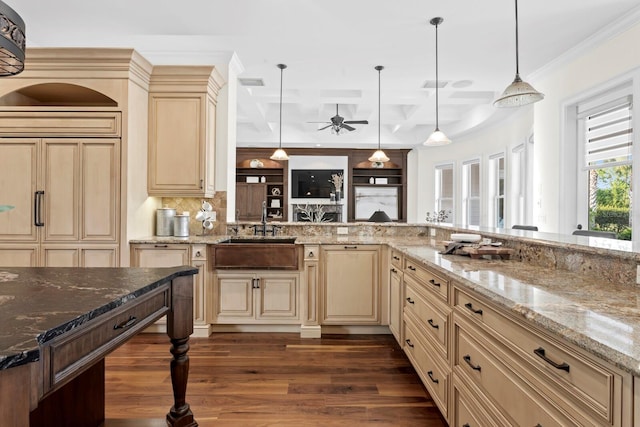 17129 Breeders Cup Dr, Odessa, FL 33556 - kitchen with cream cabinetry, ceiling fan, a sink, dark wood-style floors, and beamed ceiling