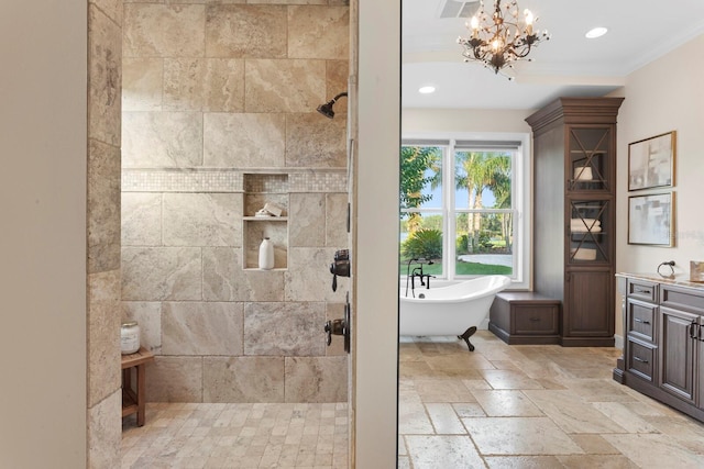 17129 Breeders Cup Dr, Odessa, FL 33556 - bathroom with tiled shower, a soaking tub, vanity, a chandelier, and crown molding