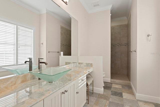 17129 Breeders Cup Dr, Odessa, FL 33556 - full bathroom with baseboards, vanity, toilet, a walk in shower, and crown molding