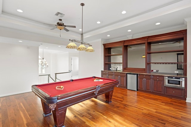 17129 Breeders Cup Dr, Odessa, FL 33556 - playroom with light wood-style flooring, ornamental molding, a ceiling fan, bar, and billiards table