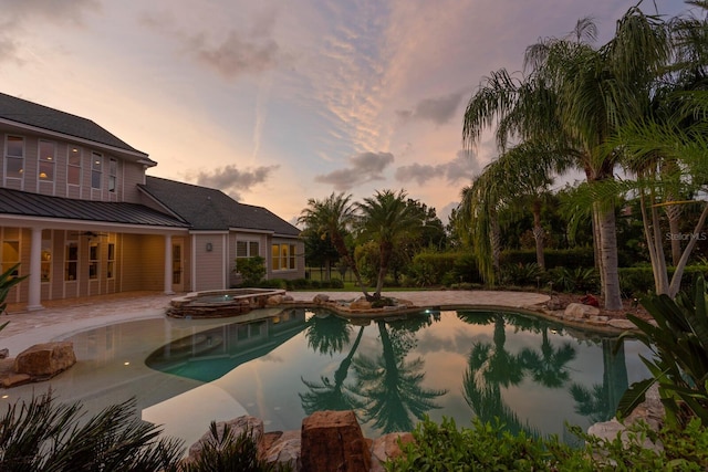 17129 Breeders Cup Dr, Odessa, FL 33556 - view of pool with a patio, a pool with connected hot tub, and ceiling fan