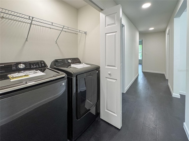 clothes washing area featuring independent washer and dryer, recessed lighting, dark wood finished floors, and baseboards