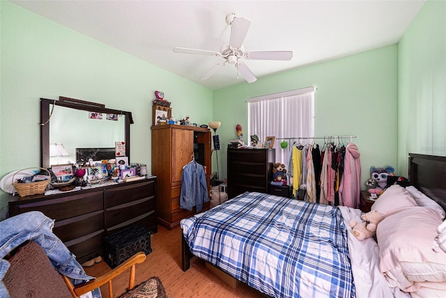 1744 Brookstone Way, Plant City, FL 33566 - bedroom featuring wood finished floors and a ceiling fan