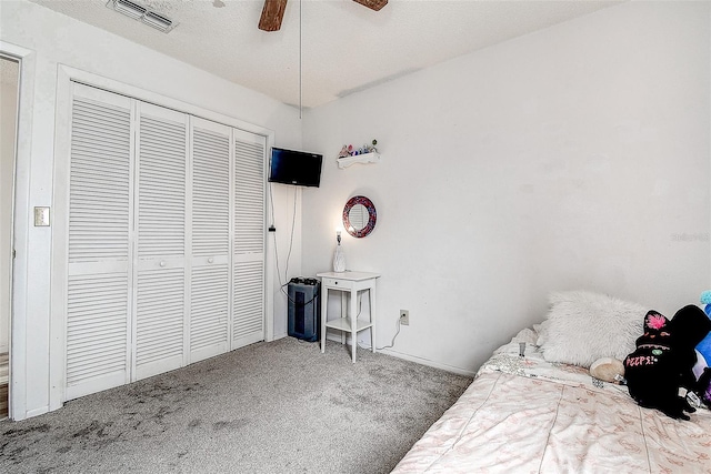 8913 Welsh Way, Hudson, FL 34667 - carpeted bedroom featuring a closet and ceiling fan