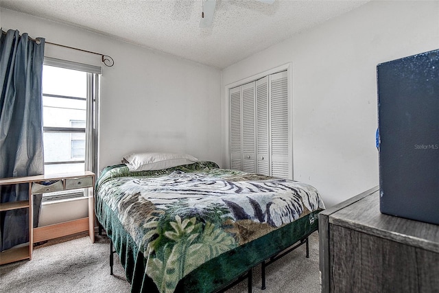 8913 Welsh Way, Hudson, FL 34667 - carpeted bedroom with a closet and a textured ceiling